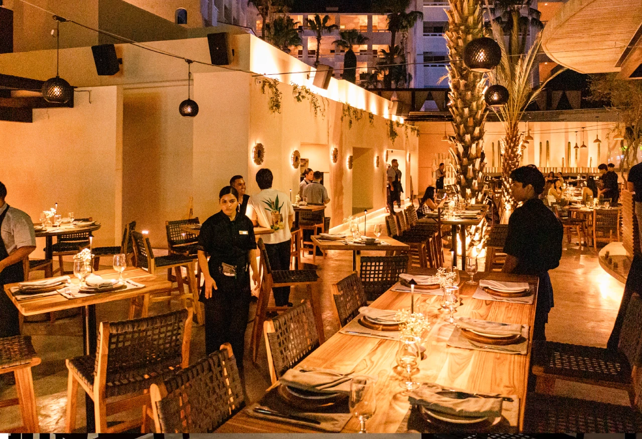 Full dining room at N'TRE Cocina al Fuego in Cabo San Lucas
